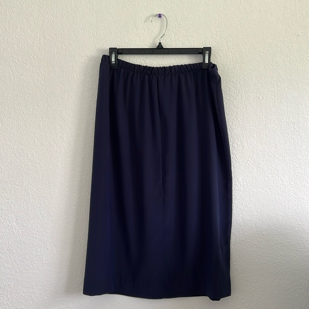 Navy blue slip under skirt.